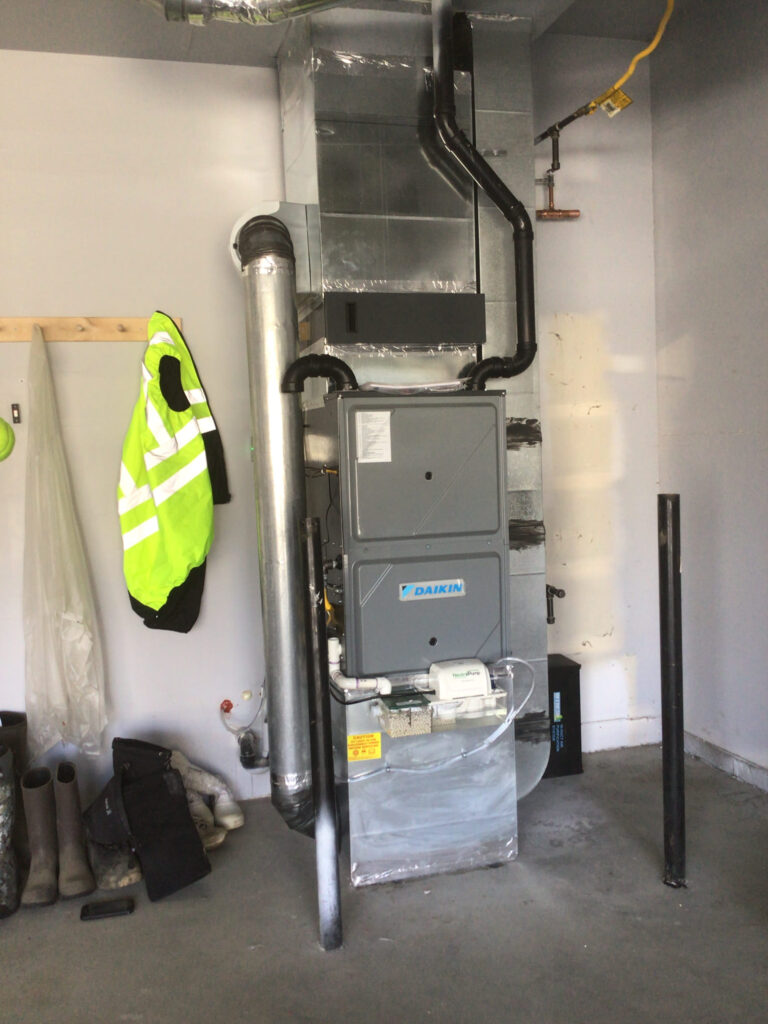 High-efficiency forced air furnace installation in a Mat-Su Valley home
