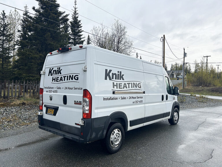 Knik Heating technician working on HVAC equipment in Wasilla